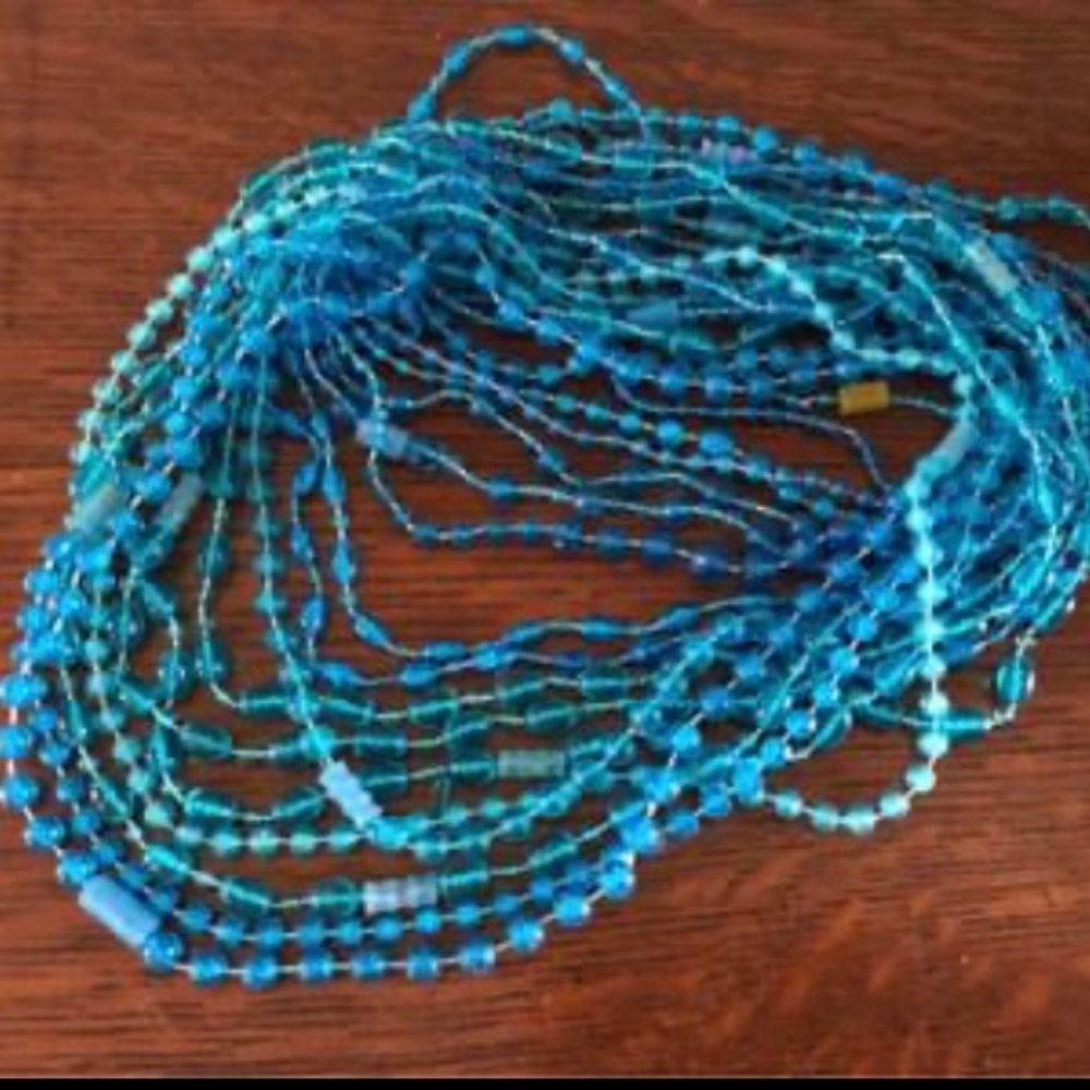 17 Strands of Vintage Mardi Gras Beads Aqua